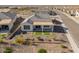 Aerial view of house showcasing the backyard and surrounding neighborhood at 18897 N 264Th Ln, Buckeye, AZ 85396