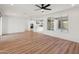 Bright living room with open concept kitchen view and large window at 18897 N 264Th Ln, Buckeye, AZ 85396