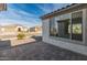 Neatly paved patio area with a view of the neighborhood at 18897 N 264Th Ln, Buckeye, AZ 85396