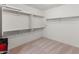 Large walk-in closet with ample shelving and hanging space at 18897 N 264Th Ln, Buckeye, AZ 85396