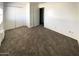 Spacious bedroom with carpet flooring and double door closet at 1945 W Sweetwater Ave # 2013, Phoenix, AZ 85029