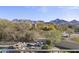 Inviting backyard oasis with a pool, spa, and mountain backdrop at 20007 N 96Th Way, Scottsdale, AZ 85255