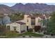 Stunning Spanish-style home with mountain views and manicured lawn at 20007 N 96Th Way, Scottsdale, AZ 85255