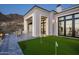 Luxury home with putting green, patio, firepit, mountain views at 21312 N 113Th Pl, Scottsdale, AZ 85255