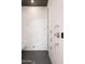 Spa-like shower with marble walls and a bench at 21312 N 113Th Pl, Scottsdale, AZ 85255