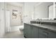 Elegant bathroom with a modern vanity and patterned floors at 21312 N 113Th Pl, Scottsdale, AZ 85255