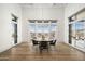 Elegant dining room with a round table, gray chairs, and mountain views at 21312 N 113Th Pl, Scottsdale, AZ 85255