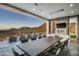 Outdoor dining and seating area with mountain views; perfect for entertaining at 21312 N 113Th Pl, Scottsdale, AZ 85255