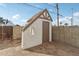 Fully fenced backyard with unique exterior building at 2209 E Weldon Ave, Phoenix, AZ 85016