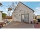 Backyard with modern outdoor seating on a concrete patio and charming string lights at 2209 E Weldon Ave, Phoenix, AZ 85016