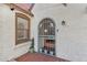 Welcoming front entrance with decorative door, brick accents, and charming details at 2209 E Weldon Ave, Phoenix, AZ 85016