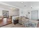 Cozy living room with ample seating and an inviting view into the dining area at 2209 E Weldon Ave, Phoenix, AZ 85016