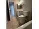 Clean bathroom with toilet, bathtub and vanity at 2255 W Rose Garden Ln, Phoenix, AZ 85027