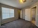 Spacious bedroom with neutral walls and carpet at 2255 W Rose Garden Ln, Phoenix, AZ 85027