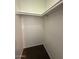 Walk-in closet with double rods for hanging clothes at 2255 W Rose Garden Ln, Phoenix, AZ 85027