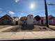 Front view of a charming house with well-maintained landscaping at 2255 W Rose Garden Ln, Phoenix, AZ 85027