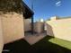 Private backyard with brick patio and small lawn at 2255 W Rose Garden Ln, Phoenix, AZ 85027