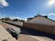 View of the back exterior and neighboring homes at 2255 W Rose Garden Ln, Phoenix, AZ 85027