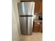 Stainless steel refrigerator in a well-lit kitchen at 2255 W Rose Garden Ln, Phoenix, AZ 85027