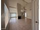 Spacious living room featuring high ceilings and tile floors at 2255 W Rose Garden Ln, Phoenix, AZ 85027