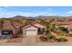 Single story home with tile roof and attached garage at 22992 W Lasso Ln, Buckeye, AZ 85326