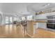 Kitchen with white cabinets, stainless steel appliances, and tile flooring at 22992 W Lasso Ln, Buckeye, AZ 85326