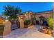 Front courtyard with seating area and ornate gate at 2310 W Hazelhurst Dr, Anthem, AZ 85086