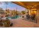 Large pool and patio with seating, perfect for entertaining and relaxation at 2310 W Hazelhurst Dr, Anthem, AZ 85086