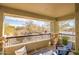 Covered balcony with scenic views and comfortable seating at 2425 W Bronco Butte Trl # 1032, Phoenix, AZ 85085