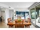 Dining area with wooden table and chairs, adjacent to the kitchen at 2425 W Bronco Butte Trl # 1032, Phoenix, AZ 85085