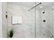 Large walk-in shower with marble tile and glass enclosure at 2425 W Bronco Butte Trl # 1032, Phoenix, AZ 85085