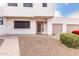 Two-story stucco home with attached garage and landscaped front yard at 2535 W Canyon Crest Cir, Phoenix, AZ 85023