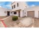 Two-story stucco home with attached garage and landscaped front yard at 2535 W Canyon Crest Cir, Phoenix, AZ 85023