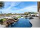 Inviting pool with waterfall feature and grassy area at 26846 N 73Rd St, Scottsdale, AZ 85266