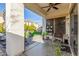 Covered patio with view of grassy backyard at 2715 S Sailors Way, Gilbert, AZ 85295