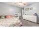 Spacious bedroom with floral bedding and ample storage at 2715 S Sailors Way, Gilbert, AZ 85295