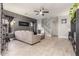 Open living room with gray walls, wood-look floors, and a view of the kitchen at 2715 S Sailors Way, Gilbert, AZ 85295