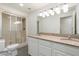 Bathroom boasts double vanity, granite countertops, and a shower at 27921 N 153Rd St, Scottsdale, AZ 85262