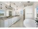 Elegant bathroom with double vanity, soaking tub, and separate shower at 27921 N 153Rd St, Scottsdale, AZ 85262