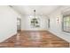 Formal dining room with hardwood floors, large windows, and recessed lighting at 27921 N 153Rd St, Scottsdale, AZ 85262