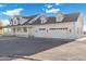 White two story home with three car garage and landscaping at 27921 N 153Rd St, Scottsdale, AZ 85262