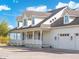 Two-story home with gray roof, white siding, and porch at 27921 N 153Rd St, Scottsdale, AZ 85262