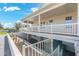 White house exterior with a large wrap around porch and landscaped yard at 27921 N 153Rd St, Scottsdale, AZ 85262