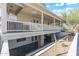 White house exterior with a large wrap around porch and landscaped yard at 27921 N 153Rd St, Scottsdale, AZ 85262