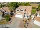 Two-story house with tan exterior and tile roof at 3210 E Brookwood Ct, Phoenix, AZ 85048