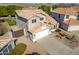 Two-story house with tan exterior and tile roof at 3210 E Brookwood Ct, Phoenix, AZ 85048