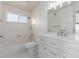 Clean bathroom with white vanity and bathtub at 3210 E Brookwood Ct, Phoenix, AZ 85048