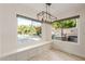 Breakfast nook with built-in bench and pool view at 3210 E Brookwood Ct, Phoenix, AZ 85048