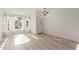 Bright and airy living room with tile floors and large windows at 3210 E Brookwood Ct, Phoenix, AZ 85048