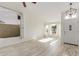 Bright and airy living room with tile floors and large windows at 3210 E Brookwood Ct, Phoenix, AZ 85048